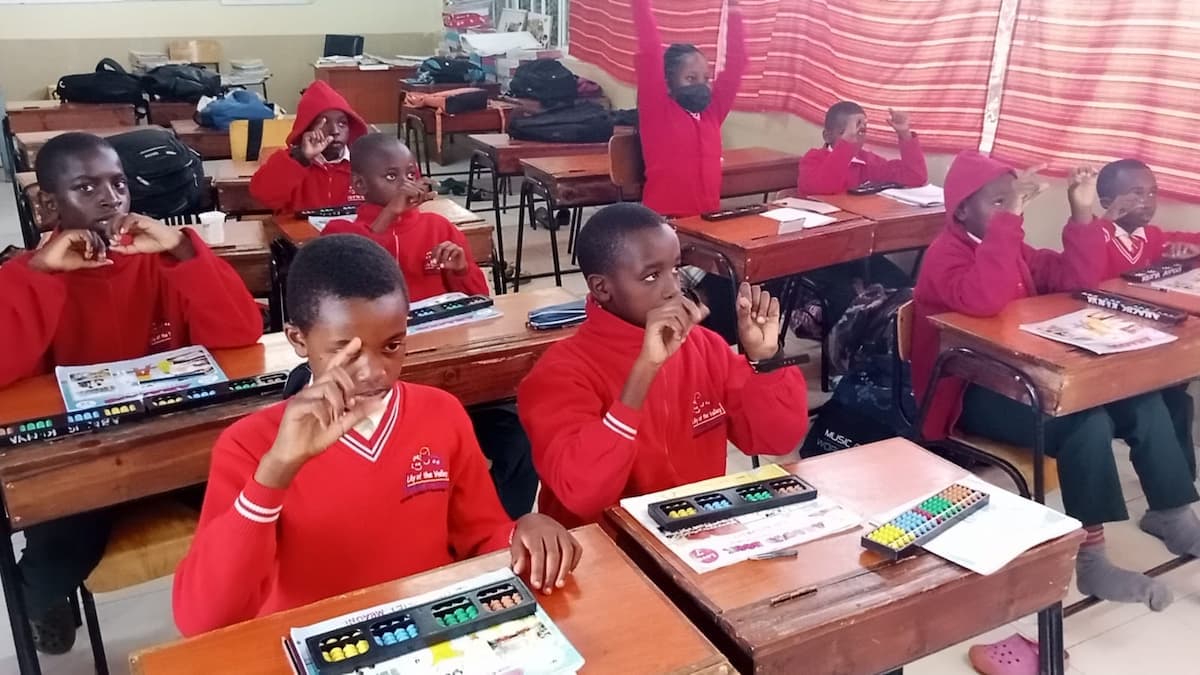 instructors teaching abacus