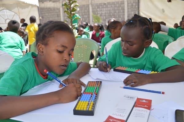 children using an abacus