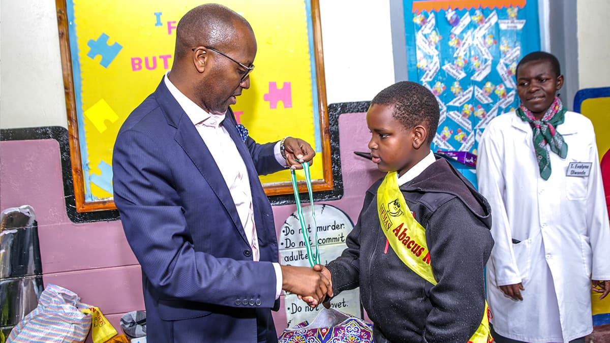 pupil being awarded