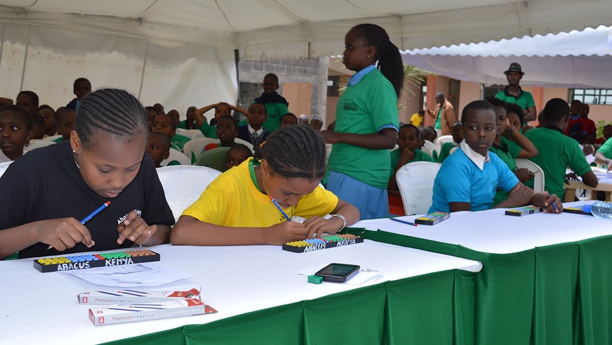 pupils working on abacus